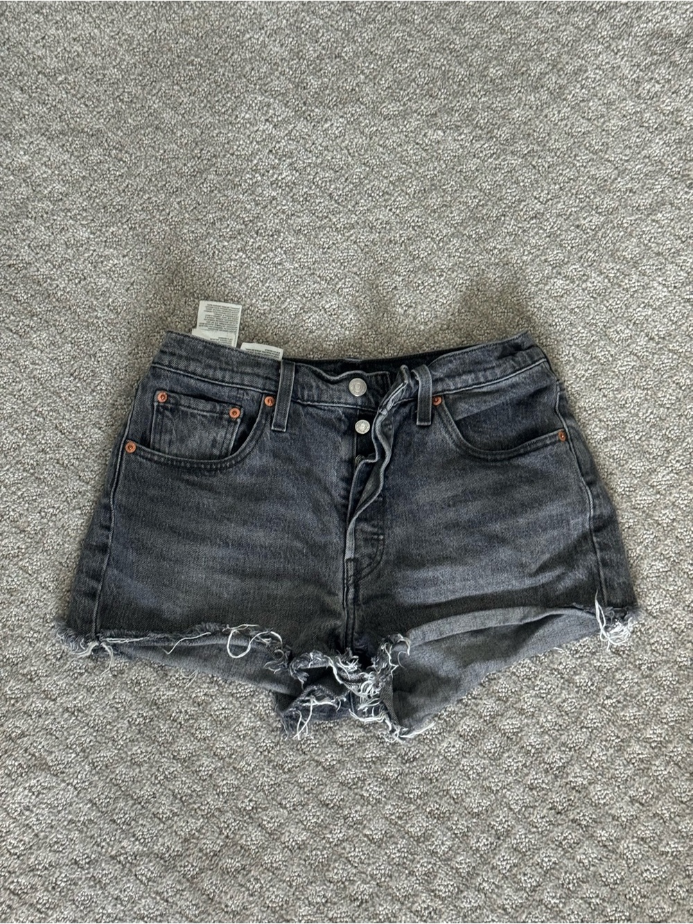 Levi’s Mid-Rise Distressed Black Denim Shorts